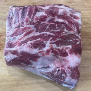 A raw Pork Shoulder Roast from Project FarmSTAND's heritage pork that's ready to cook